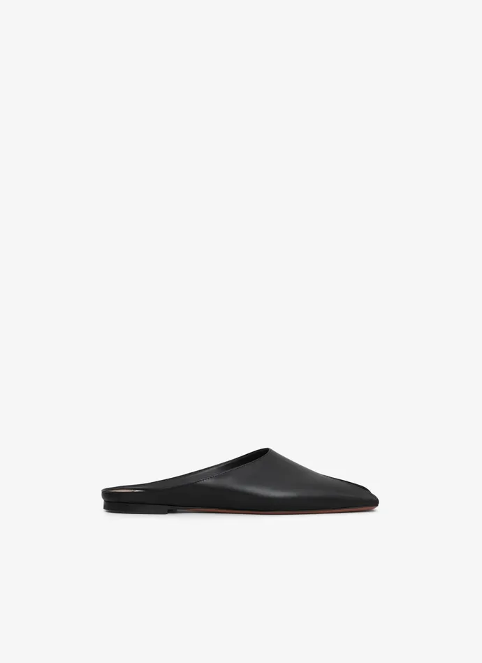 Black SPIKE FLAT MULES IN CALFSKIN Women Alaa Flat Shoes