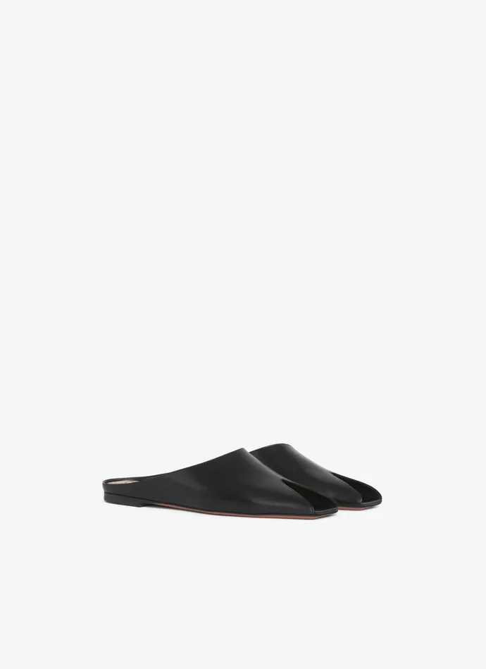 Black SPIKE FLAT MULES IN CALFSKIN Women Alaa Flat Shoes